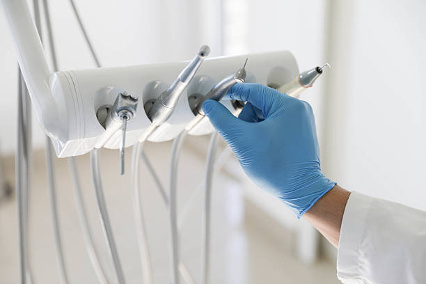 Professional Tooth Extraction technician working in Cambridge, MA